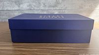 Blue Stuart Weitzman shoe box side profile