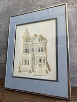 Full view of framed Debbie Patrick dimensional artwork