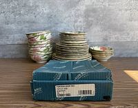 Stacks of bowls and plates, Johnson Bros box front