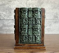 front view showing green relief panel and wood frame