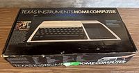 Front of box showing Texas Instruments Home Computer branding and product image