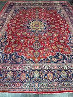 Full view of Mashhad rug showing overall pattern and colours