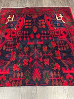 Full overhead view of entire rug showing pattern and borders