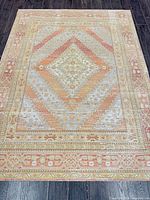 Full view of the rug showing pattern and colors