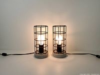 Both lamps illuminated showing design and function