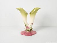 Full view of double cornucopia vase showing overall form and colors