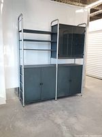 Front angled view showing full unit with side ladder frame, cabinets, shelves