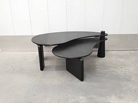 Overall view showing two-tier kidney bean silhouette and leg design