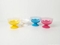 Front view of all four coloured pedestal dessert bowls