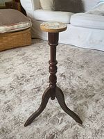 Full view of wooden pedestal base showing height and tripod legs