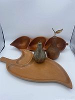 All four items grouped: two wood trays and two hammered metal pears