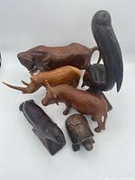 All six wooden animal figurines grouped