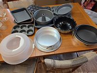 All bakeware items arranged on table