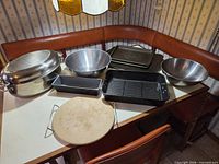 All ten bakeware pieces displayed on table