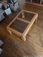 Top view showing two glass panels within oak frame