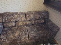 Front view of patterned sleeper sofa