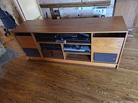 Front view of cabinet with stereo components installed