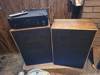 Yamaha receiver on top of pair of MDS speakers