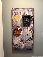 Front view of metal wall art showing full design and rotary phone