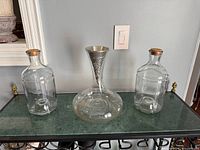 Front view of all three glass pieces on shelf