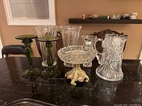 Entire group of crystal and glass pieces on countertop