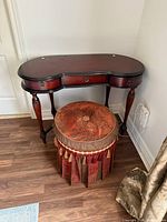 Vanity table front with stool beneath