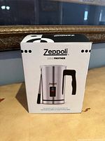 Front view of sealed Zeppoli milk frother box
