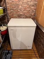 Front view of white Danby chest freezer