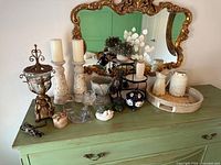 Front view of entire group on green dresser