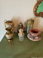 Group shot of all six decorative pieces on tabletop