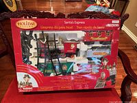 Front view of boxed Holiday Living Santa’s Express train set in retail packaging