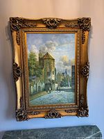 Front view of framed painting showing full artwork and frame detail