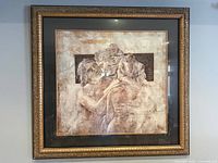 Front view of framed print with ornate frame