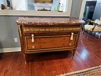 Front and side view showing marble top, drawers, gilt mounts