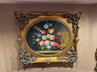 Front view of framed floral still life reproduction