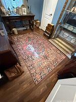 Full view of Surya Iris rug in room setting showing overall pattern and size