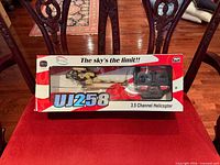 Front view of boxed UJ258 helicopter and controller