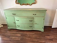 Front angled view showing overall form, color and hardware