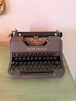 Front view of Underwood portable typewriter showing keys and logo