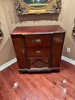 Front view of Victrola wood console showing overall design and finish