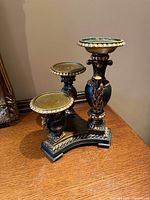 Front view showing three platforms and ornate carvings