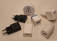 All seven adapters arranged on surface