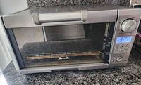Front view showing Breville mini smart oven on countertop