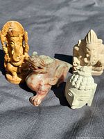 Group shot of all four carved figures