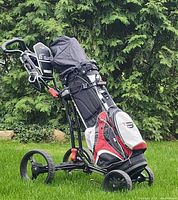 Bag on Axglo trolley loaded with clubs