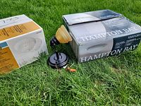 Two Hampton Bay boxes, single spotlight fixture, wire nuts visible
