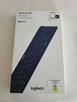 Front of retail box displaying Logitech Keys-To-Go model and compatibility