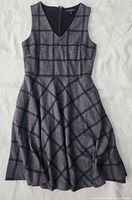 Front view of Banana Republic grey plaid dress laid flat
