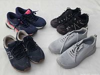 Group shot of all four pairs displayed side by side on white background