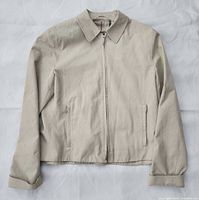 Front view of Burberry beige jacket showing overall style